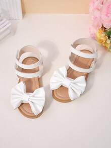1 Pair Of Girls' White Big Bow Sandals Made Of Faux Leather Material, With Exposed Toes, A Middle Top, Hook And Loop, Flat Heels, Sweet Princess Style, Roman Sandals, Birthday Party Performance, Daily Shoes - White - View 6