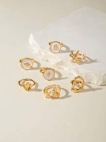 7件套简约时尚合金滴油个性化扇贝海星戒指套装，几何线条镂空可叠戴戒指，适合日常佩戴、休闲、派对、送礼