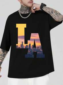 Camiseta con estampado del horizonte de Los ángeles. Tela de calidad, cuello redondo, corte holgado, cómoda, dise?o gráfico. - Negro - Ver 1
