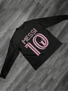Bold Graphic Featuring Large Number 10 With Triumphant Silhouette Inside Symbolizing Victory And Achievement Paired With MESSI Lettering 100% Cotton Men Tshirt - màu đen - Xem 1