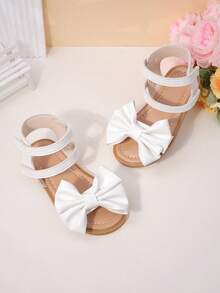 1 Pair Of Girls' White Big Bow Sandals Made Of Faux Leather Material, With Exposed Toes, A Middle Top, Hook And Loop, Flat Heels, Sweet Princess Style, Roman Sandals, Birthday Party Performance, Daily Shoes - White - View 4