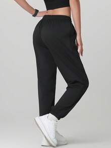 Pantalones deportivos elásticos y transpirables de corte holgado - Adecuados para uso casual y entrenamiento, primavera/verano - Negro - Ver 7