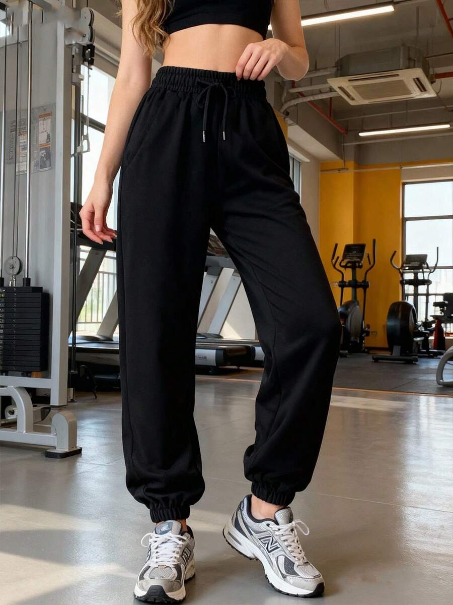 Pantalones deportivos elásticos y transpirables de corte holgado - Adecuados para uso casual y entrenamiento, primavera/verano - Negro - Ver 1