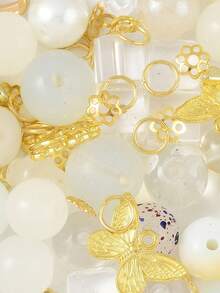 一套DIY配件包，包含50克玻璃珠、40个铁针、2条扭链、6个合金吊坠、2个珠框和20个铁珠帽及开口圈，颜色可选：黑色/白色/紫色/粉色/青柠绿，尺寸：5.5~16x6~11.5x6.5~10.5毫米，孔径：1.2~1.6毫米 - Glass - 查看 12