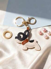 1个PU皮革法斗犬钥匙扣 - 可爱的斗牛犬造型，眼神灵动，黑白相间的耳朵，经久耐用，是情人节、生日、日常使用的理想礼物（可挂在包包、钥匙上，宠物爱好者必备） - 迷人的PU皮革法斗犬，配有棕色项圈和爪印，亮面黑白设计，是女士时尚和节日礼物的理想之选 - 彩色 - 查看 6