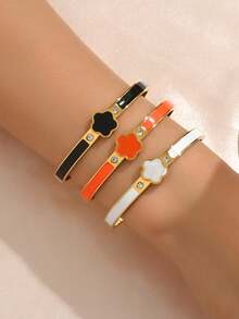 1条五叶草手链，经典黑、橙、白配色，金色边框镶嵌闪亮水钻，精致小巧，可单独佩戴或叠戴，时尚女士饰品。 - 五葉草 - 查看 2