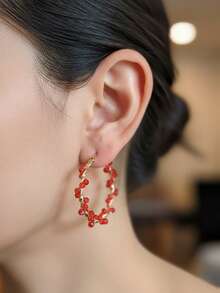 Aros Elegantes con Cristales Rojos y Toque Dorado - Rojo - Ver 2