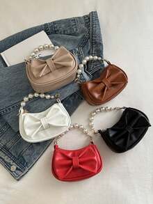 Este es un nuevo y lindo bolso de mano de nicho de alta gama con decoración de lazo. Es una nueva bolsa de moda y con un esquema de color fresco y vibrante. Se puede llevar en la mano, pero la correa para el hombro no es ajustable. Es casual pero elegante, perfecto para salir y también hace un gran regalo para amigos. - Bolsos de moda - Ver 2