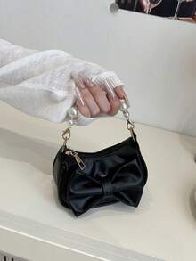 Este es un nuevo y lindo bolso de mano de nicho de alta gama con decoración de lazo. Es una nueva bolsa de moda y con un esquema de color fresco y vibrante. Se puede llevar en la mano, pero la correa para el hombro no es ajustable. Es casual pero elegante, perfecto para salir y también hace un gran regalo para amigos. - Bolsos de moda - Ver 13