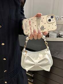 Este es un nuevo y lindo bolso de mano de nicho de alta gama con decoración de lazo. Es una nueva bolsa de moda y con un esquema de color fresco y vibrante. Se puede llevar en la mano, pero la correa para el hombro no es ajustable. Es casual pero elegante, perfecto para salir y también hace un gran regalo para amigos. - Bolsos de moda - Ver 11