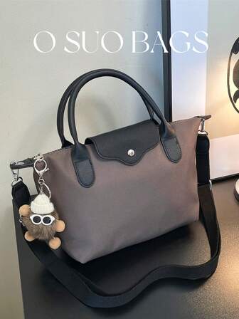 冬季新款迷你时尚手提包，采用撞色设计，尼龙防水面料，单肩包、方形包和蔬菜篮包款式，适合通勤上班、聚会和假日约会。尺寸：长12.6英寸*宽4.3英寸*高7.9英寸