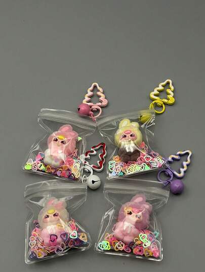 1个最新款KEYCEO兔子摆件系列PVC装饰模型玩偶，精致的圣诞树造型钥匙扣，带闪光和透明保护袋，轻巧便携，是新年限量版礼物、感恩节礼物、圣诞节礼物和其他节日礼物的理想之选，适合派对、嘉年华、家庭聚会等场合。