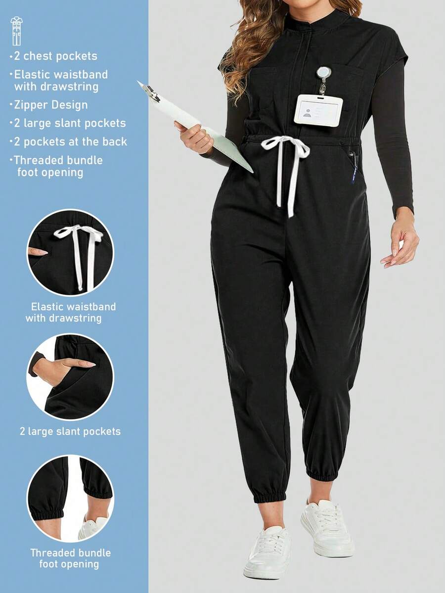 Cimmuovere Mono de talla grande con manga corta, cintura anudada, pliegues, cremallera y cuello alto - Negro - Ver 1