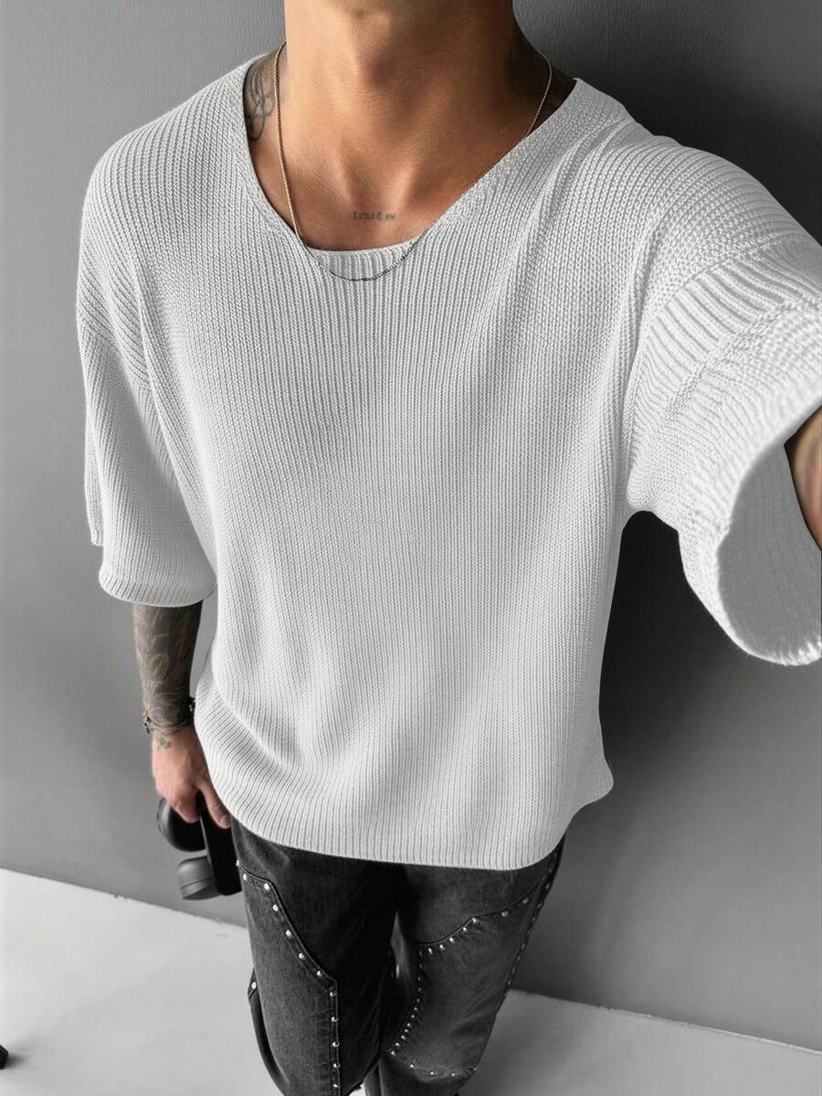 Camiseta de punto de manga corta de corte holgado y cuello redondo de unicolor para hombres de talla grande