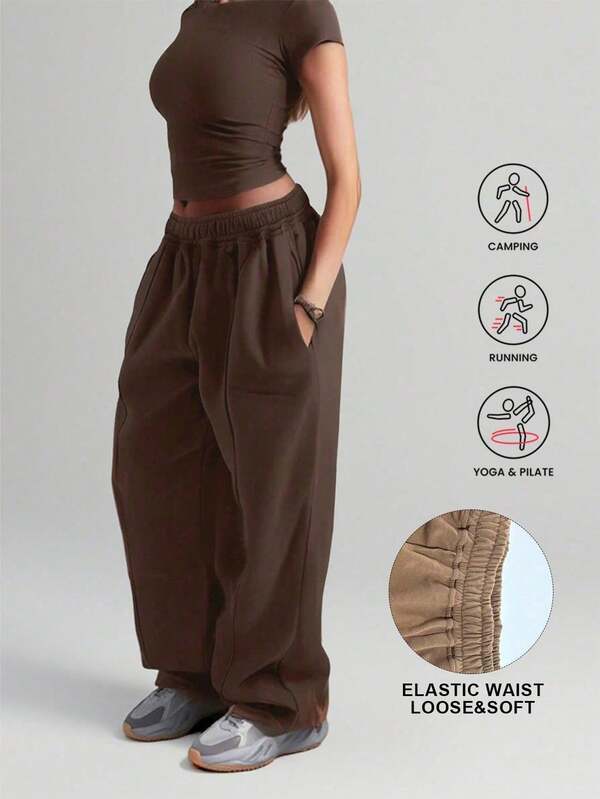 Pantalones deportivos sólidos casuales y holgados con bolsillo para mujer talla grande