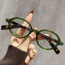 这款新款玳瑁纹小框眼镜采用复古日式椭圆形轻盈镜框和镜腿，时尚感十足。 - 無色 - 查看 13