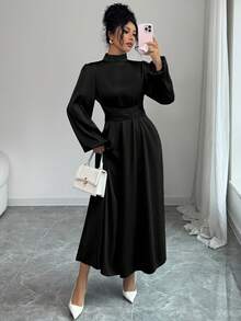 Đầm dài dáng chữ A thanh lịch dành cho nữ, cổ đứng, tay dài, vạt xòe, chất liệu vải dệt, chi tiết thắt nút, màu đen, thích hợp cho mùa xuân. - màu đen - Xem 2