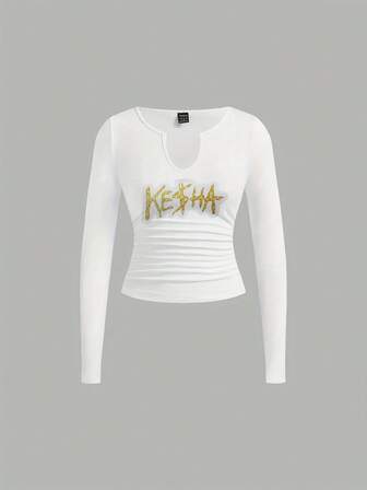 Black Long - Sleeved Crop Top With Ruched Mid - Torso, Gold 'KERMA' Graffiti Print, Deep V - Neck, Long Fitted T - Shirt For Fashion - Forward Womenlong Sleeve Tops Women Winter Clothes For Women Long Sleeve Tops - Women's Winter Outfits: Elegant Conjunto De Mujeres + Flowy Top, Blusas & Top Negro