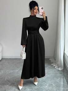 Đầm dài dáng chữ A thanh lịch dành cho nữ, cổ đứng, tay dài, vạt xòe, chất liệu vải dệt, chi tiết thắt nút, màu đen, thích hợp cho mùa xuân. - màu đen - Xem 5
