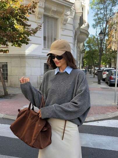 Nuevo suéter de punto de cuello redondo gris de otoño e invierno para mujer, de manga larga y corte holgado. Prenda de vestir femenina, de estilo sencillo y atmosférico, ideal para el uso diario y el estilo casual de calle.