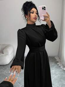 Đầm dài dáng chữ A thanh lịch dành cho nữ, cổ đứng, tay dài, vạt xòe, chất liệu vải dệt, chi tiết thắt nút, màu đen, thích hợp cho mùa xuân. - màu đen - Xem 4