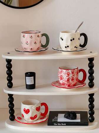 一套11盎司（约314毫升）手工彩绘陶瓷咖啡杯碟，图案精美，品质上乘。可用作下午茶杯、卡布奇诺杯或普通咖啡杯。也可作为节日礼品。