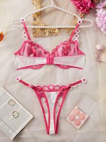 1 conjunto de sujetador de mujer en color rosa suave con un diseño llamativo, adornado con bordados florales, y su construcción semi-con aros proporciona un excelente soporte. - Rosa - Ver 6
