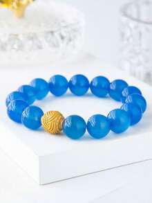 VE سوار من العقيق الأزرق عالي الجودة الطبيعي، مزين بخرز فوانيس معدنية. العقيق الأزرق يوازن الطاقة، وخرز الفوانيس يضيء الطريق، والبريق الناعم يكمل لون البشرة، مصنوع يدويًا، مجوهرات علاجية مناسبة للارتداء اليومي. قد تختلف لون الأحجار الكريمة الطبيعية. - الأزرق - مشاهدة 3