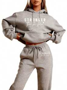 ChristmasLC Women's Casual- 'Stronger Than The Storm' Letter Print Hoodie, White, Loose Fit With Pockets, Perfect Autumn And Winter, Comfortable Clothing |     Loose Fit Hoodie |     Casual Daily Wear Pants, Halloween Costumes, Thanksgiving Clothing, Hoodie Autumn And Winter, Unisex Short Sleeves,,, Plus Size Fall Clothes, Sweatshirt, Fall Clothes WomenLoose And Comfortablechristmas Outfit Women - Grey - View 1