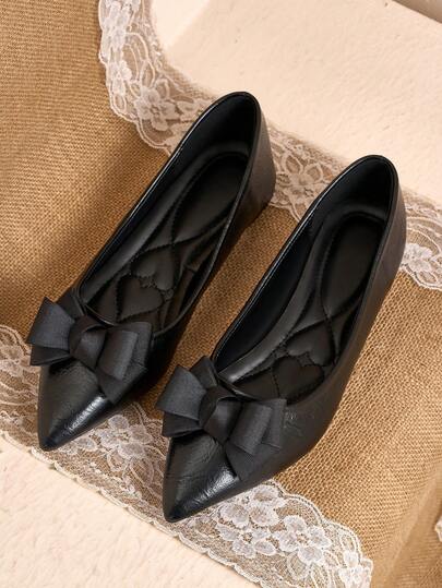 Versatile Classic Black Satin Bow Pointed Toe Flat Shoes. The Delicate Satin Texture Feels Soft And High-End. The 3D Bow Detail Adds A Gentle And Graceful Touch. The Pointed Toe Design Flatters The Foot Shape And Appears Slender. The Soft Lining Provides A Comfortable Fit. The Flat Silhouette Allows For Easy Walking. Suitable For Commuting, Dating, And Shopping. Pair With A Knit Midi Skirt For A Sweet, Feminine Look Or With Straight-Leg Jeans For A Casual, Relaxed Vibe. A Versatile Wardrobe Staple That Suits Multiple Styles.