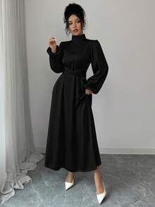 Đầm dài dáng chữ A thanh lịch dành cho nữ, cổ đứng, tay dài, vạt xòe, chất liệu vải dệt, chi tiết thắt nút, màu đen, thích hợp cho mùa xuân. - màu đen - Xem 7