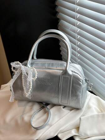 女士高级小众保龄球包，2025新款多功能撞色枕形包，肩背斜挎复古小方包，配精致吊坠