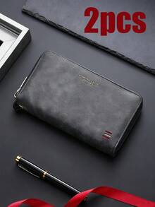 Ce nouveau portefeuille pour hommes présente de multiples emplacements pour cartes, un design long et décontracté, ainsi qu'une grande capacité. C'est un portefeuille long classique de style Sapele avec une touche rétro, doté d'un design à grande capacité, d'une fermeture éclair sécurisée et d'une portabilité. C'est le choix parfait pour les hommes élégants à la recherche à la fois d'organisation et de style, idéal pour les cadeaux de Noël, la Saint-Valentin ou les anniversaires. - Multicolore - Voir 14