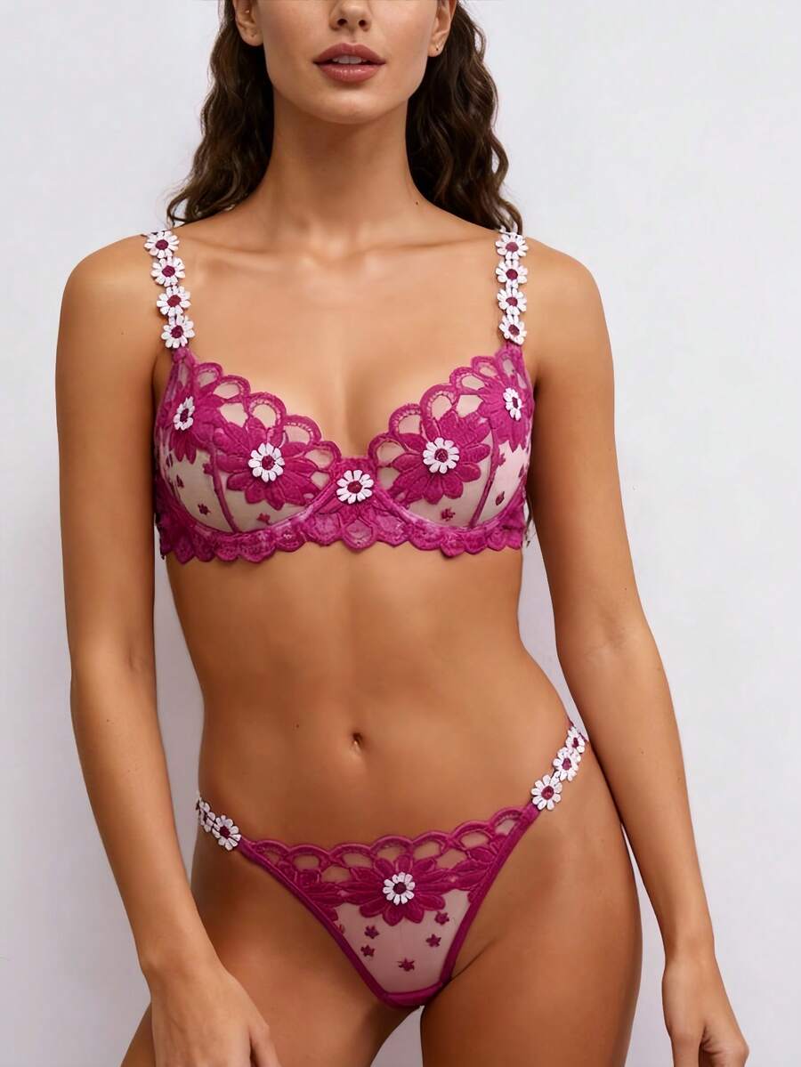 1 conjunto de sujetador de mujer en color rosa suave con un diseño llamativo, adornado con bordados florales, y su construcción semi-con aros proporciona un excelente soporte. - Rosa - Ver 1