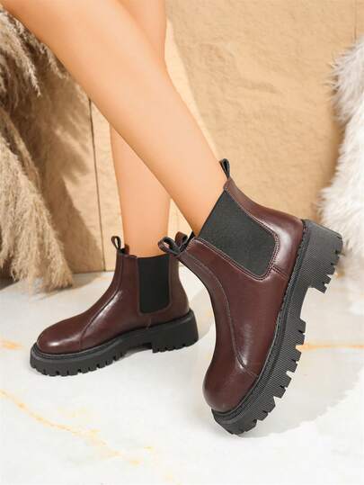 Chelsea-stövlar med tjock sula för dam, tjock sula som nyckelelement, rund tå till mitten av vaden med resårdekor, tjock platt klack, korta Chelsea-stövlar i retrostil, brittisk pendlingsstil, lämpliga för kvinnors dagliga arbete och utflykter på hösten/vintern, konstlädermaterial, brittiska Chelsea-stövlar med tjock sula
