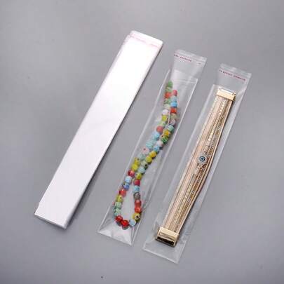 100pcs Transparent Self-Adhesive Seal Bags For Jewelry Storage Jewelry Necklace Bracelet Packaging Supplies, Stationery Pen Gift Slender OPP Sealing Bags Small Business Supplies