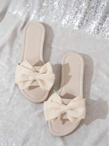 Elegant Women's Flat Sandals, Round Toe Black Bow Tie Party Shoes, Versatile Fashion Matching Dresses, Casual Outdoor Beach Slippers, Open Toe Slides - Beige - View 1