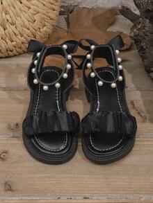 1 par de sandalias de moda con suela gruesa para niñas de talla grande, en color negro, con tiras de malla con volantes, lazo de tela en el talón, perla, cierre, diseño de punta redonda simple, cómodas y lindas sandalias romanas para la playa, adecuadas para niñas de 3 a 15 años, primavera/verano - Negro - Ver 1