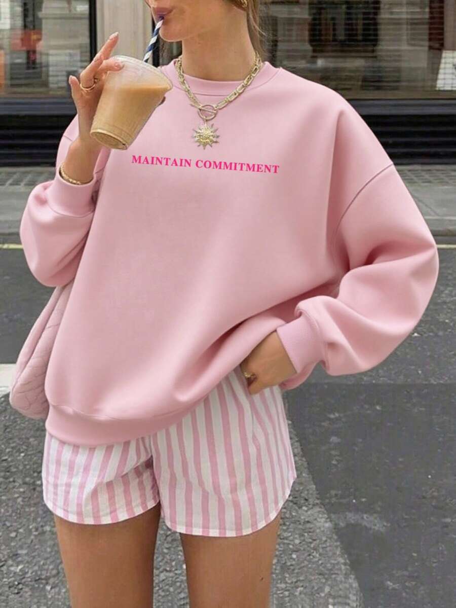 女士秋冬季“坚持承诺”标语印花长袖圆领卫衣，休闲宽松百搭的假日风上衣，时尚秋季女装，适合日常穿着，粉色 - 粉色 - 查看 1