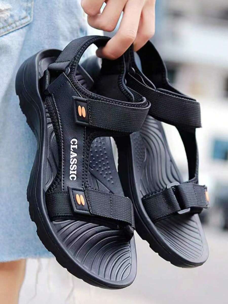Sandalias deportivas para hombres al aire libre - zapatillas transpirables de gancho y bucle de moda de verano - suela EVA de dos colores con gráficos de letras antideslizante, gran tamaño, livianas - adecuadas para playa, vadear, conducir, escalar, zapatos casuales negros - Negro - Ver 1