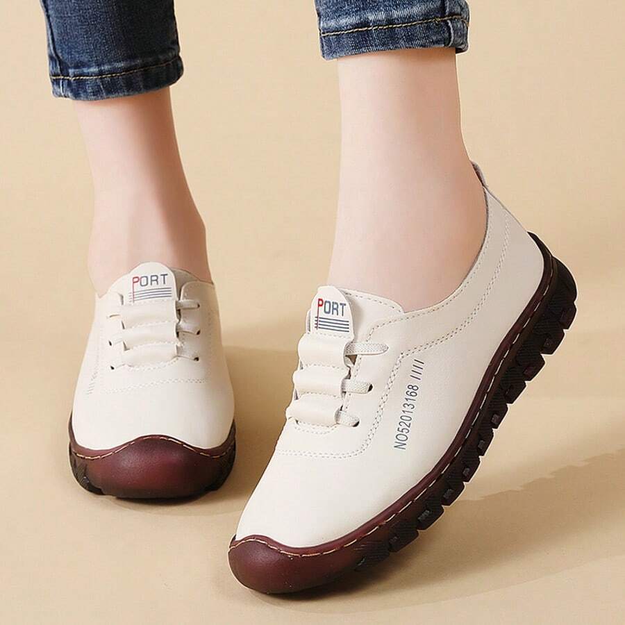 أحذية سلامة العمل للنساء، أحذية مسطحة ذات لون واحد، أحذية كاجوال ناعمة وراحة القدم، أحذية جديدة برؤوس مستديرة وأعلى منخفض مخاطة يدويًا - بيج - مشاهدة 1