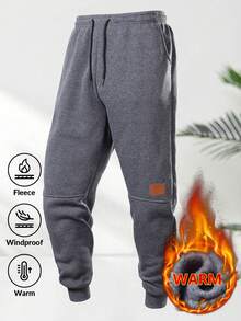 男士保暖运动裤，带口袋和抽绳，撞色皮革贴片，腰部可调节，裤脚收口，穿着舒适。 - 深灰色 - 查看 11