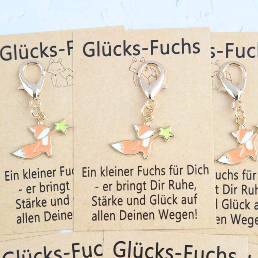 一套9件德国幸运狐狸钥匙扣套装，包含幸运故事卡，新年、乔迁、生日礼物、德国祝福、派对礼品、圣诞节生日礼物套装 - 橘色小狐狸 - 查看 1