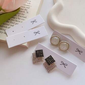 25/50/100 Piezas Tarjetas de presentación de pendientes con "Lazo" impreso en ellas, Soporte clásico blanco para joyas, Empaque minorista