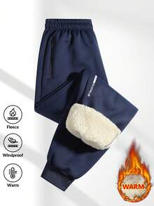 1 pieza de pantalones casuales de hombre con cordones en las piernas y bolsillos con cremallera, con forro de lana de cordero grueso para mantener el calor y una experiencia de uso cómoda y acogedora.