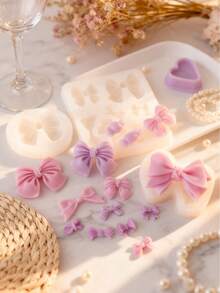 蝴蝶结造型硅胶模具套装，耐热高弹性硅胶模具，用途广泛——可用于制作蜡烛、石膏/绘画、减压玩具、摄影背景、家居装饰、派对礼品、手工礼物等，一体成型，柔韧易清洗，可重复使用。