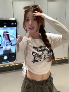 英文蝴蝶印花长袖T恤T2025，韩版新款小美式复古短款女上衣