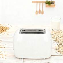 Tostadora de doble ranura ancha, con una ranura extra ancha que admite pan de corte grueso. Su diseño compacto y su exterior frío al tacto facilitan una limpieza sin esfuerzo. El calentamiento rápido y eficiente garantiza resultados perfectos para las necesidades del desayuno, lo que la convierte en la opción ideal para bagels, tostadas y sándwiches. - Blanco - Ver 11