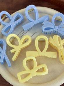 4pcs Acrylic Cream-Colored Cross-Shaped Yellow And Blue Solid-Color Bow Hair Clip Accessory For Creating A Simple And Elegant Hairstyle For Girls Elegant Claw Clips Casual Hair Claws