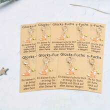 一套9件德国幸运狐狸钥匙扣套装，包含幸运故事卡，新年、乔迁、生日礼物、德国祝福、派对礼品、圣诞节生日礼物套装 - 橘色小狐狸 - 查看 5